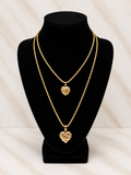 Gold double heart necklace displayed on black bust, a perfect Gift for Mother from Daughter.